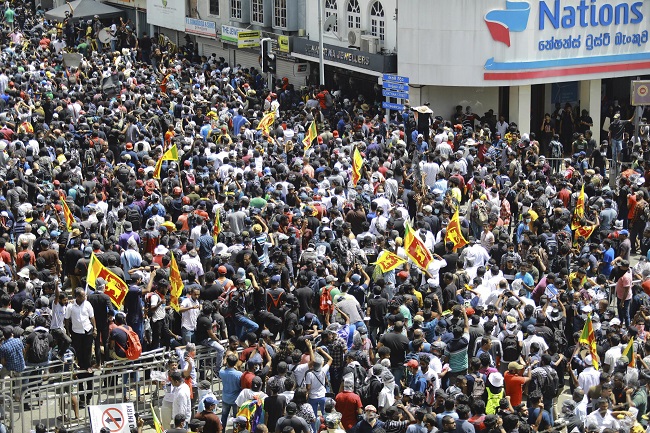 Sri Lanka Leader Flees As Protesters Storm Home, Office | International