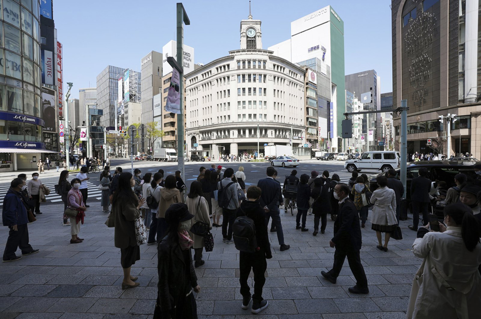 Bank Of Japan Sticks To Easing, Raises Inflation Forecast | Business