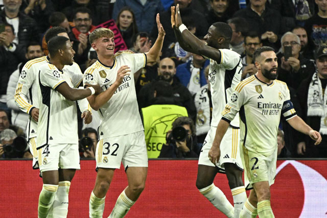 Madrid finish first after entertaining win over Napoli