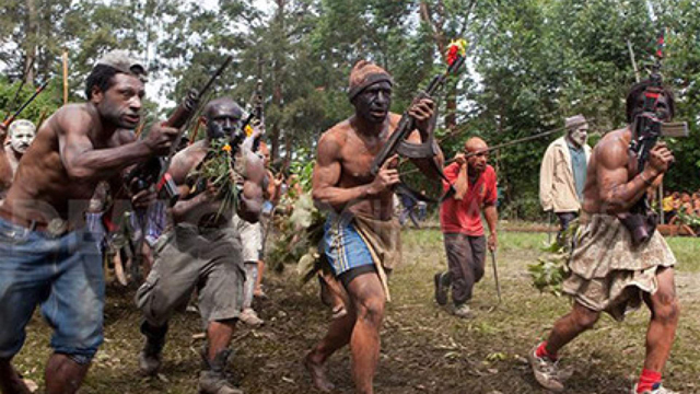 Tribal shootouts near PNG gold mine kill at least 30