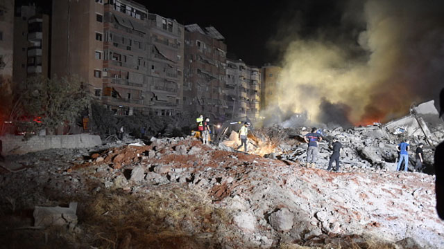 Families flee Israeli strikes on Beirut's southern suburbs