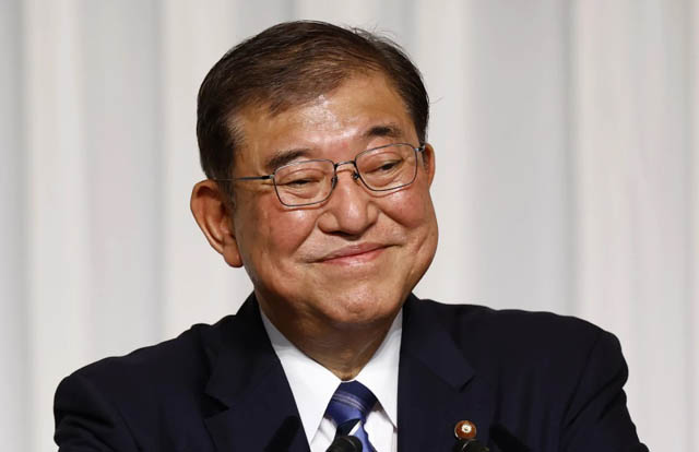 With bulging in-tray, Ishiba to become Japan PM