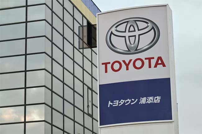 Toyota maintains net profit forecast despite drop in first half