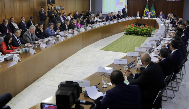 Brazil central bank hikes key interest rate to 11.25%