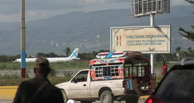 US bans flights to Haiti after three jetliners hit by gunfire