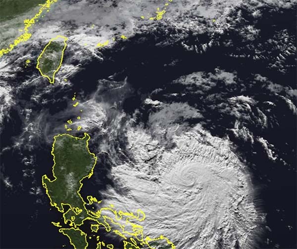 Evacuations and call for aid as Typhoon Usagi approaches Philippines