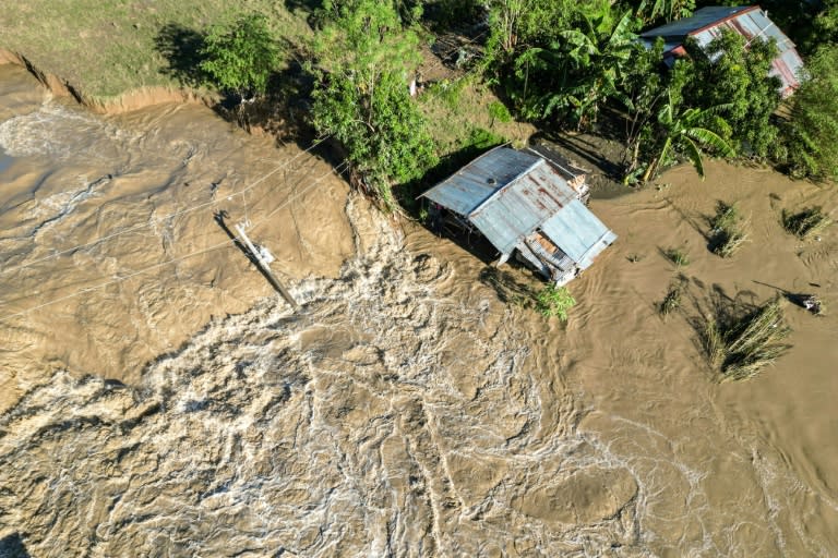 Burst dike leaves Filipino farmers under water