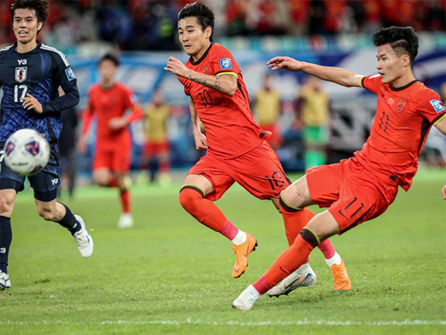 Ruthless Japan beat China to move to brink of World Cup qualification