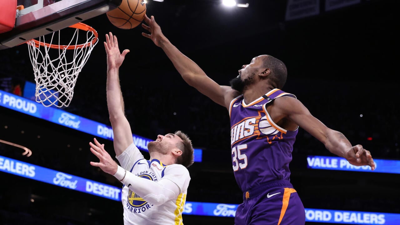 Durant and Booker lead NBA Suns over Warriors