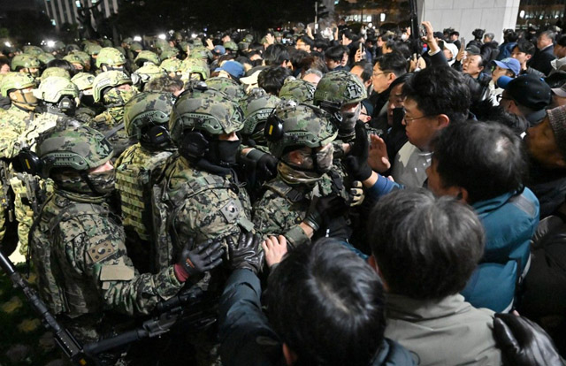 S. Korea opposition says to file insurrection charges against president over martial law