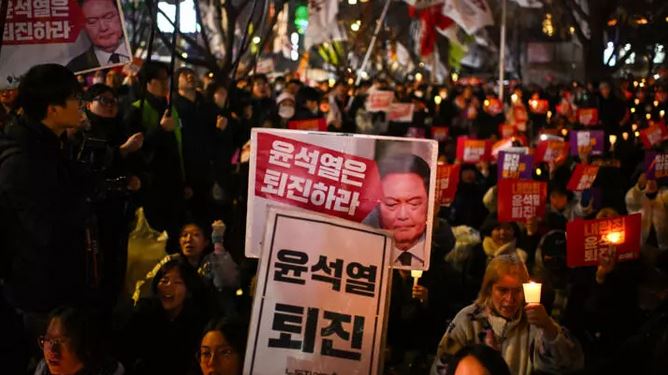 South Korea president clings to power after martial law U-turn