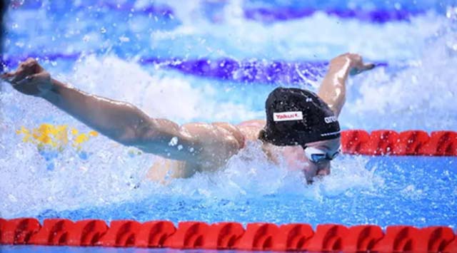 Walsh leads continued attack on records at short-course worlds