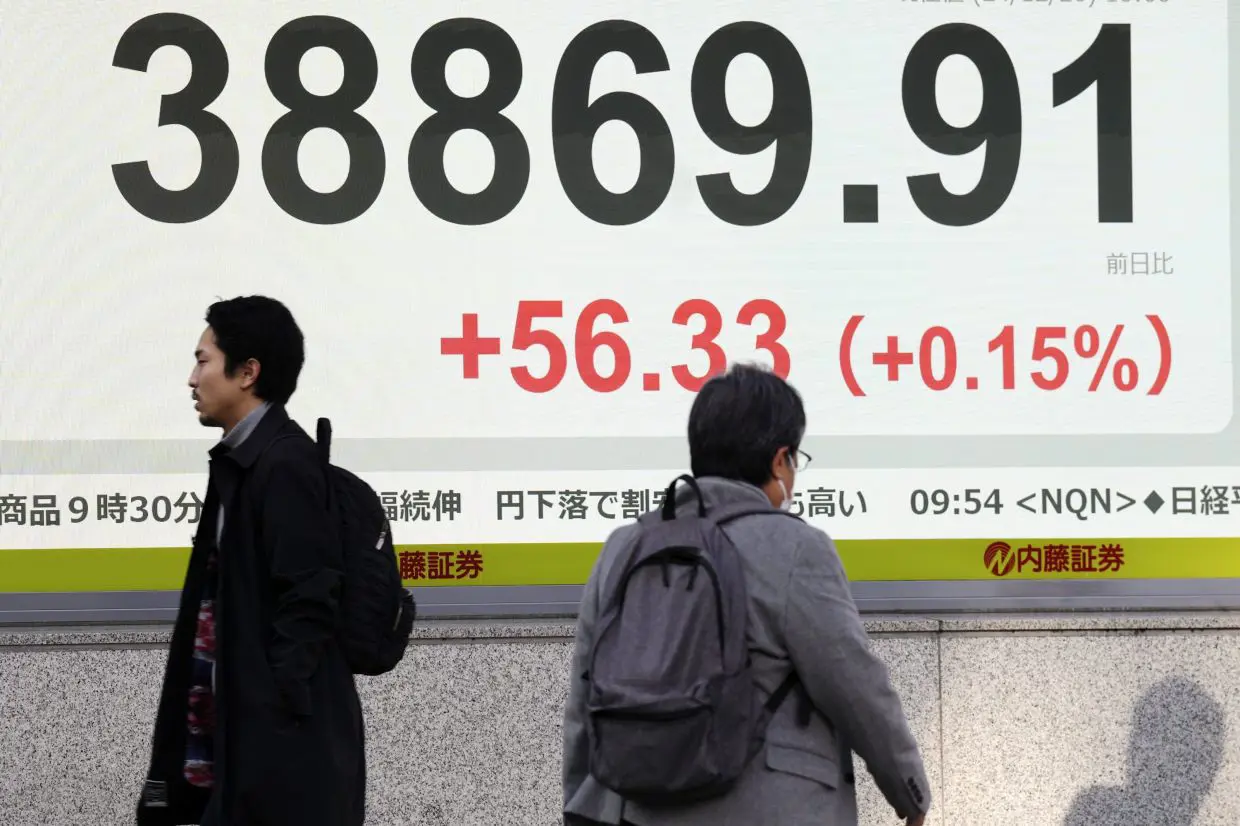 Asian markets mixed as traders digest Fed's hawkish pivot