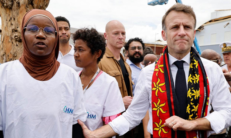 Macron extends visit cyclone-hit Mayotte after locals vent anger