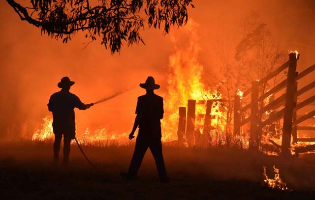 Thousands told to evacuate as bushfire west of Australia's Melbourne triples in size