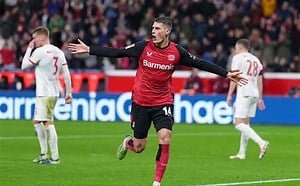 Schick hits four as Leverkusen close gap to Bayern on sombre weekend