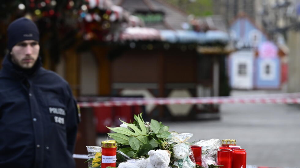 Germany pledges security inquest after Christmas market attack