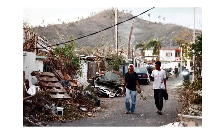 French PM says Mayotte cyclone likely to have killed 'dozens' not 'thousands'