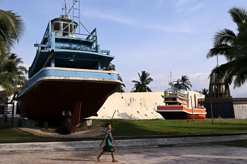 Tears, prayers as Asia mourns tsunami dead 20 years on