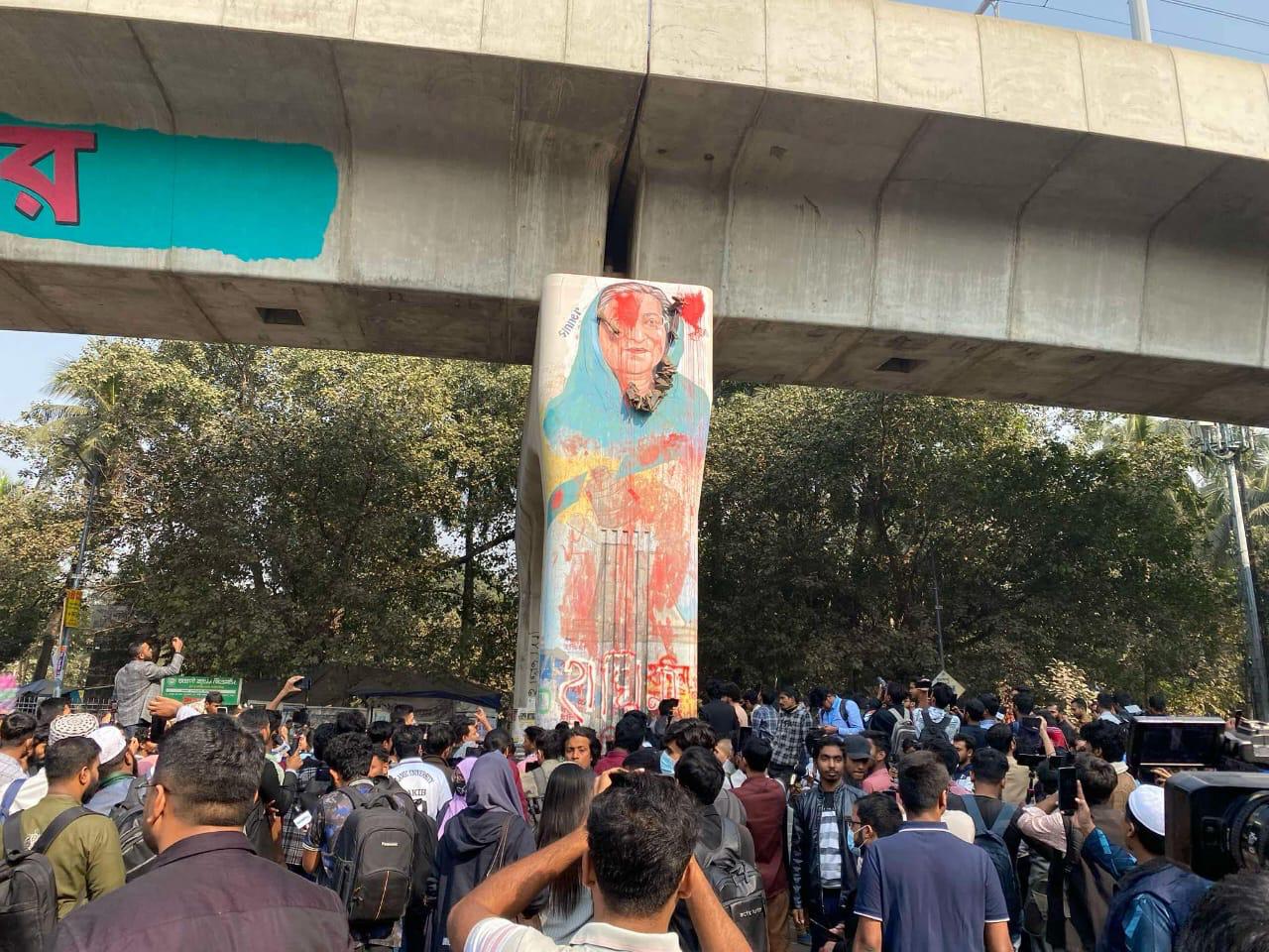 Students recreate Hasina's graffiti, hang shoe-chain