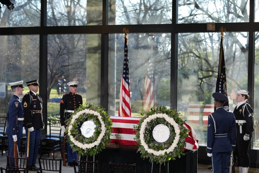 Bells toll to begin final sendoff for former US president Carter