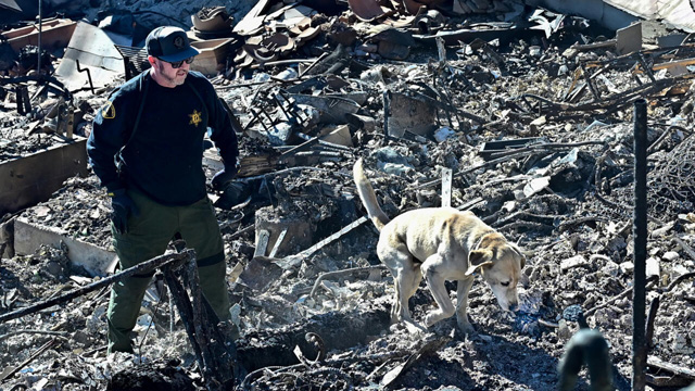 Search for bodies as LA firefighters brace for more wind