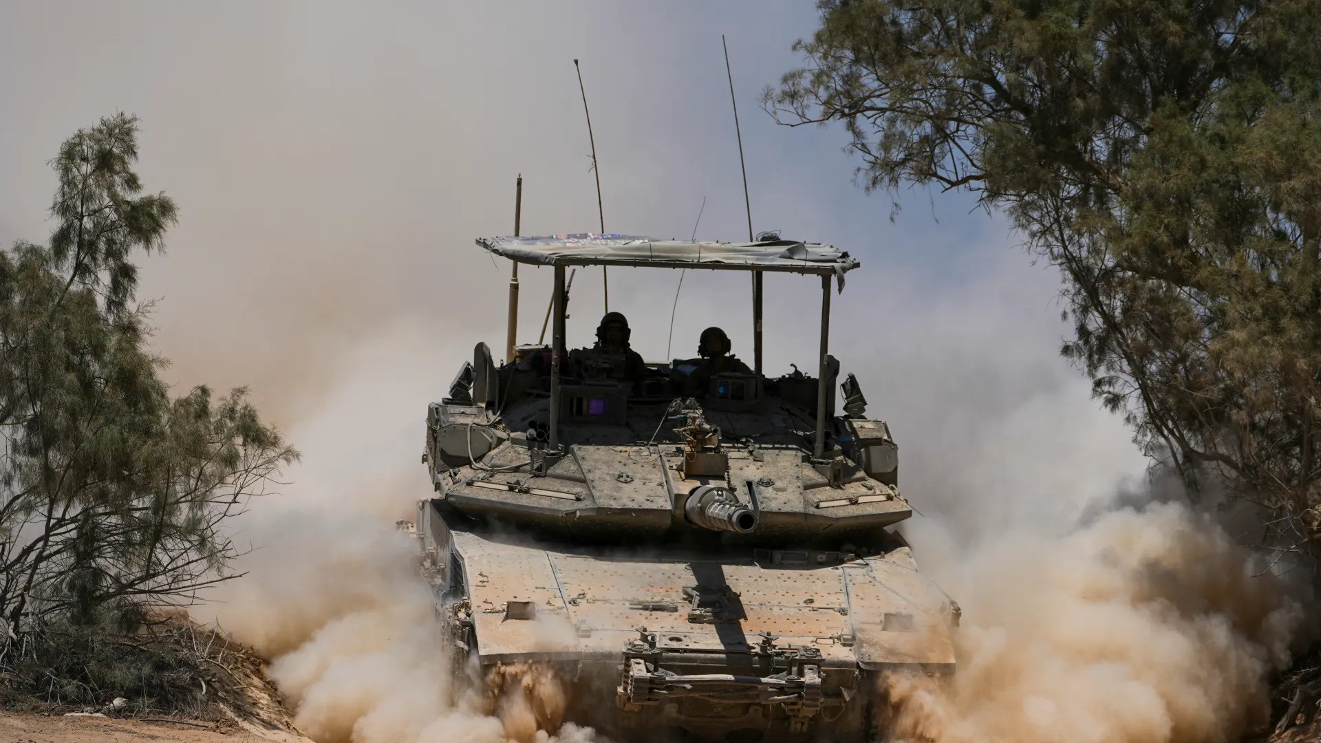 Israel army warns Gaza residents against approaching forces, buffer zone