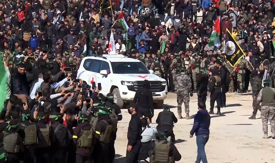 Four Red Cross vehicles arrive at Gaza square for hostage handover: AFP