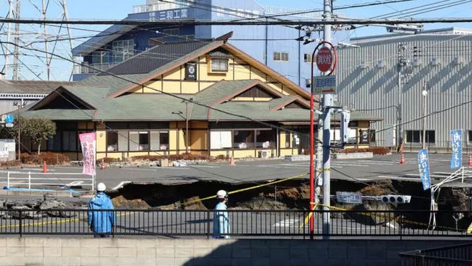 1.2 million in Japan told to use less water to help sinkhole rescue