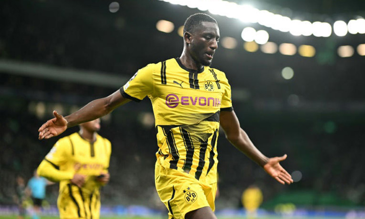 Classy Guirassy puts Dortmund in driving seat against Sporting