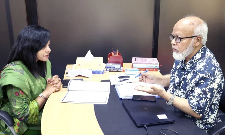 BSS reporter Rumana Jaman conducts an interview with Professor Tofail Ahmed. Photo: BSS